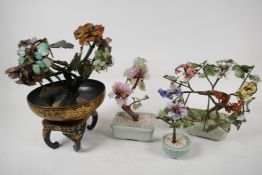 An antique Chinese hardstone tree on a lacquered stand, 10" high, together with three other