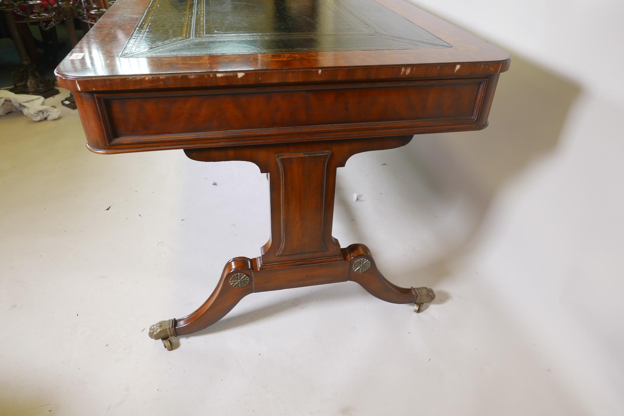 A Regency style mahogany six drawer partner's library table, with leather inset top, bears label - Image 4 of 7