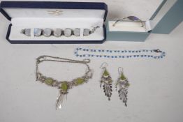 A delicate unmarked silver and green hardstone suite of necklace and earrings, together with a