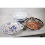 A Chinese porcelain bowl decorated with flowers, 12" diameter, a brightly coloured bowl in the style