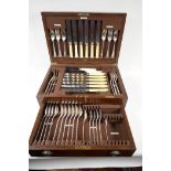 An oak cased canteen of Mappin and Webb silver plated rattail cutlery, missing carving knife and