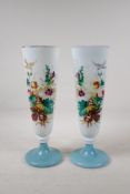 A pair of Victorian opaline glass vases with hand painted floral decoration, 12" high