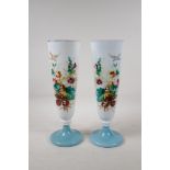 A pair of Victorian opaline glass vases with hand painted floral decoration, 12" high