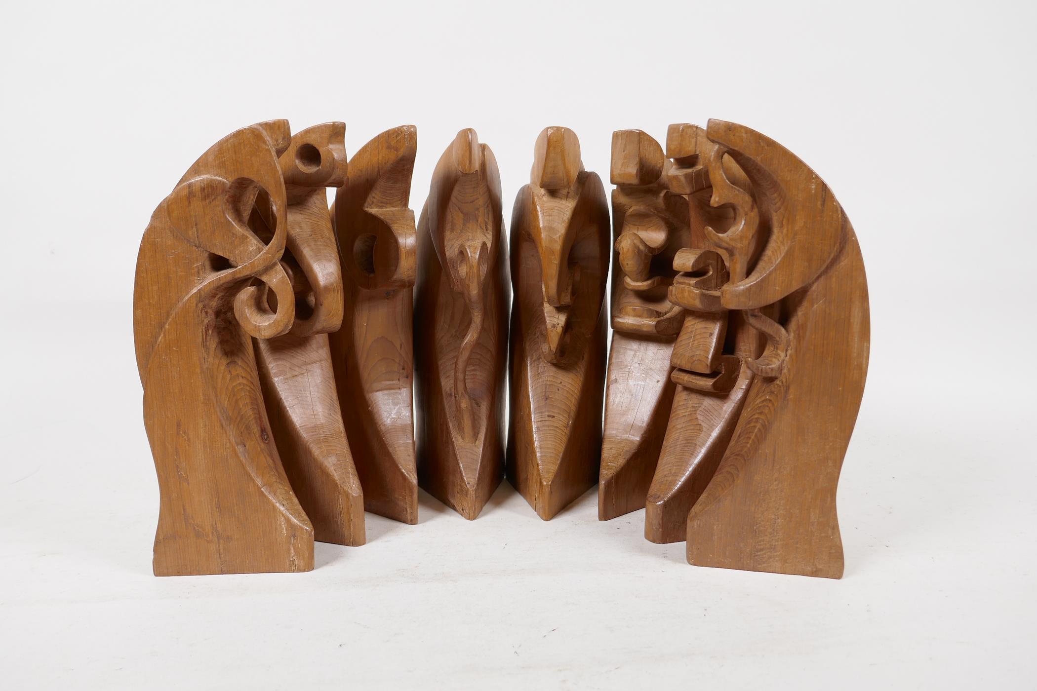 Jerry Newman, Affinity, an eight piece turned and carved wood abstract figurual sculpture,