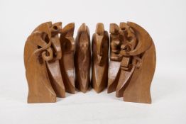 Jerry Newman, Affinity, an eight piece turned and carved wood abstract figurual sculpture,