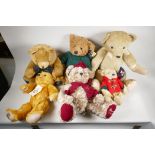 A vintage 'House of Nisbet' teddy bear (patched) 22" long, four Harrods bears, 1994, 1998, 1999