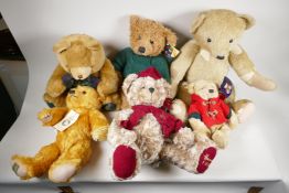 A vintage 'House of Nisbet' teddy bear (patched) 22" long, four Harrods bears, 1994, 1998, 1999
