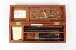 A field surgeons kit by Arnold & Sons, London, for Clive & Co, containing scalpels, a cut throat,