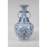 A Yuan style blue and white porcelain two handled vase with decorative panels depicting mythical