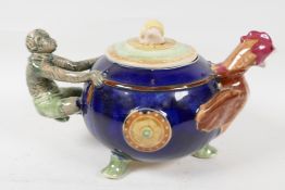 A replica 'Monkey & Chicken' pottery teapot, 10" long