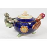 A replica 'Monkey & Chicken' pottery teapot, 10" long