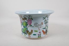 A Chinese famille vert porcelain jardiniere decorated with cockerels in a landscape, 7" high x