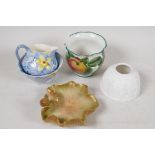 A Royal Worcester lily pad pin tray, 5" diameter and a Wemyss vase painted with apples, both A/F,