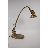 An early C20th adjustable brass bench/desk lamp, bears registration number 734123/4