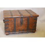 An antique hardwood silver chest with forged iron straps and carrying handles, 39" x 26" x 24"