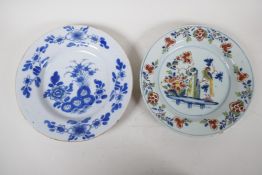 A late C18th tin glazed Delft plate painted with a parrot and flowers in bright enamels, 9" diameter