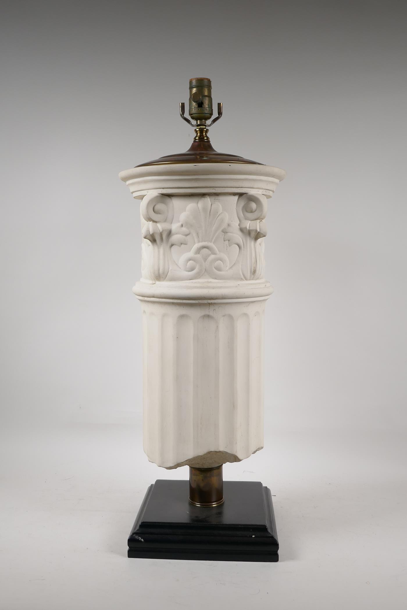 A ceramic and brass mounted table lamp in the form of a Corinthian column capital, 26" high