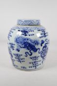 A Chinese blue and white porcelain ginger jar and cover decorated with fo dogs, 11" high