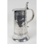 A C19th French polished pewter cider tankard, engraved with an inscription dated 1882, 10" high