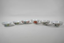 Six assorted Chinese republic period porcelain tea bowls with famille rose and vert enamel