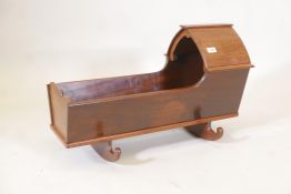 A Georgian mahogany cradle on rockers, 29" x 13" x 18"