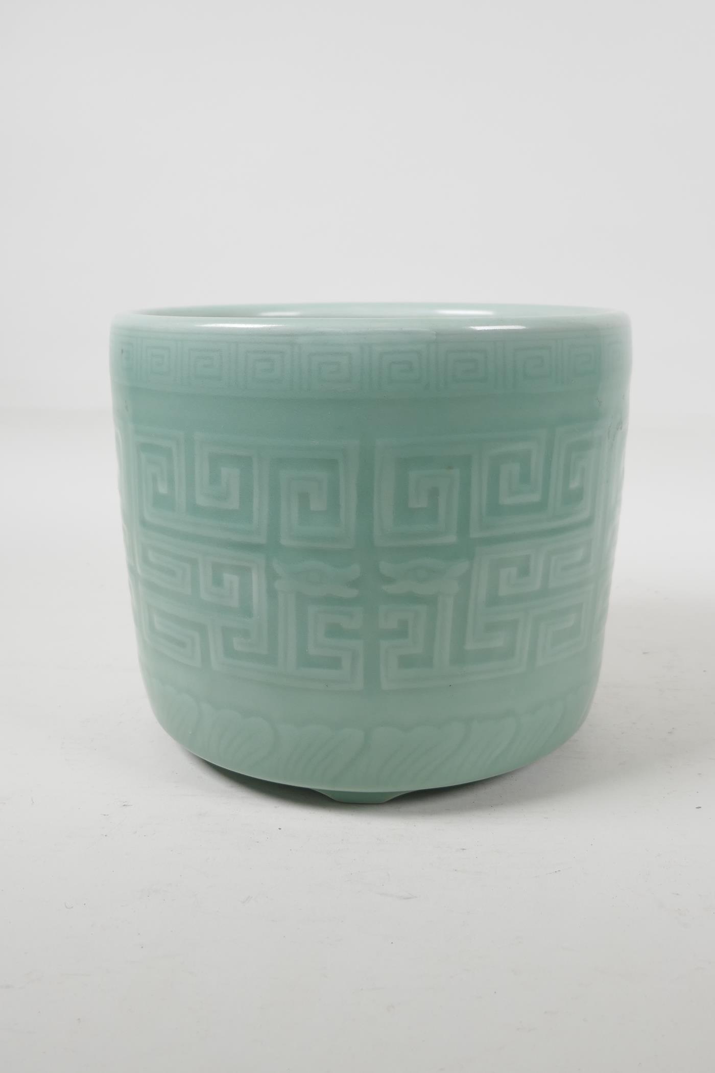 A celadon glazed porcelain brush pot with archaic style underglaze decoration, Chinese, 6½" high x - Image 2 of 4