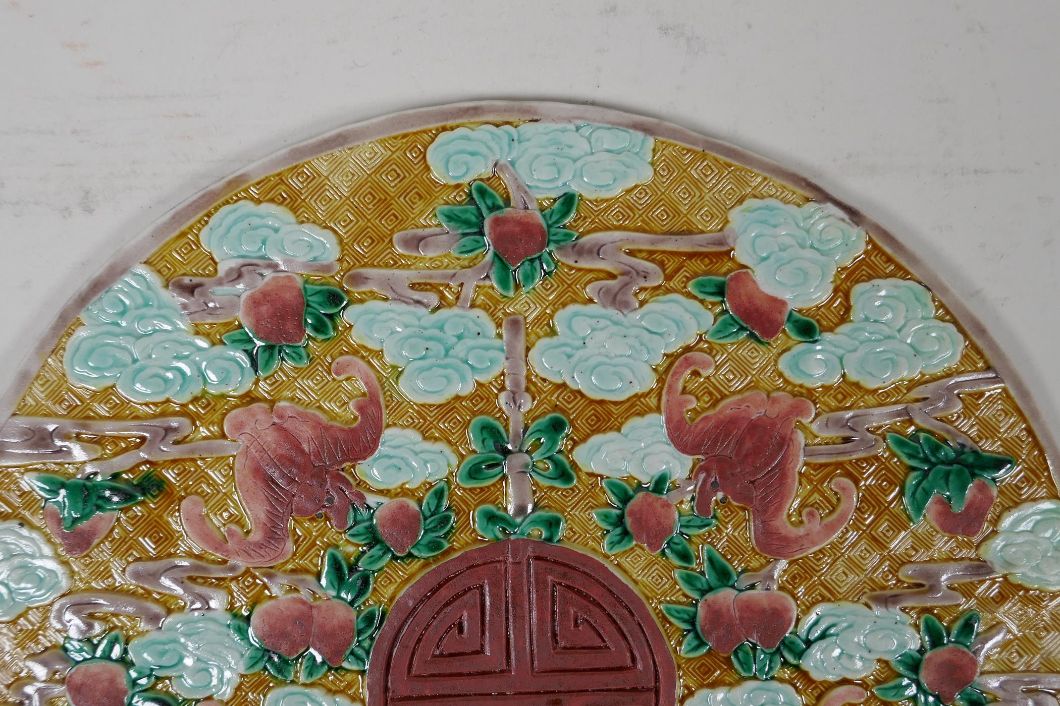 A Chinese Sancai glazed porcelain panel with raised peach, bat and auspicious symbol decoration, 8½" - Image 4 of 5