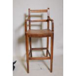 A C19th fruitwood correction chair on square tapered supports, seat 22" high