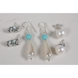 Three pairs of sterling silver drop earrings, 1" drop