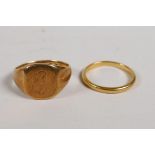 A 22ct gold wedding band, 2.8g, size L/M and an 18ct gold signet ring, 7.3g, size O/P