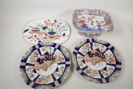 A C19th ironstone tazza, and an ironstone strainer plate, and two Masons 10" plates, 1 A/F