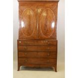 A Regency inlaid figured mahogany linen press with four long graduated drawers, 49" x 22", 84" high
