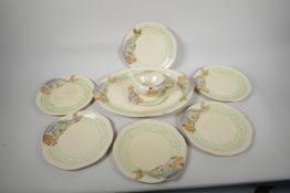 Clarice Cliff for Wilkinson, a nine piece fish service, serving plate 15" x 10", six 8½" plates,