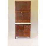 A 1930s Hygena oak kitchen unit, the upper cupboards with metal spice racks, the central section