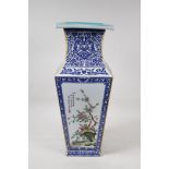 A Chinese blue and white porcelain vase of square form, with famille vert decorative panels