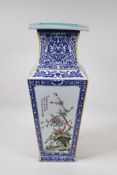 A Chinese blue and white porcelain vase of square form, with famille vert decorative panels