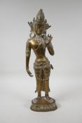 An Indian bronze figure of Shiva on a lotus flower plinth, 17" high