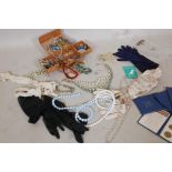 A small quantity of vintage costume jewellery, a pair of Dents Lady's gloves etc and four First