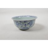 A Chinese blue and white porcelain rice bowl decorated with boys flying kites, 5½" diameter