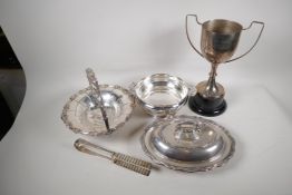 A silver plated cake basket with swing handle, 10" diameter, together with an entree dish and cover,