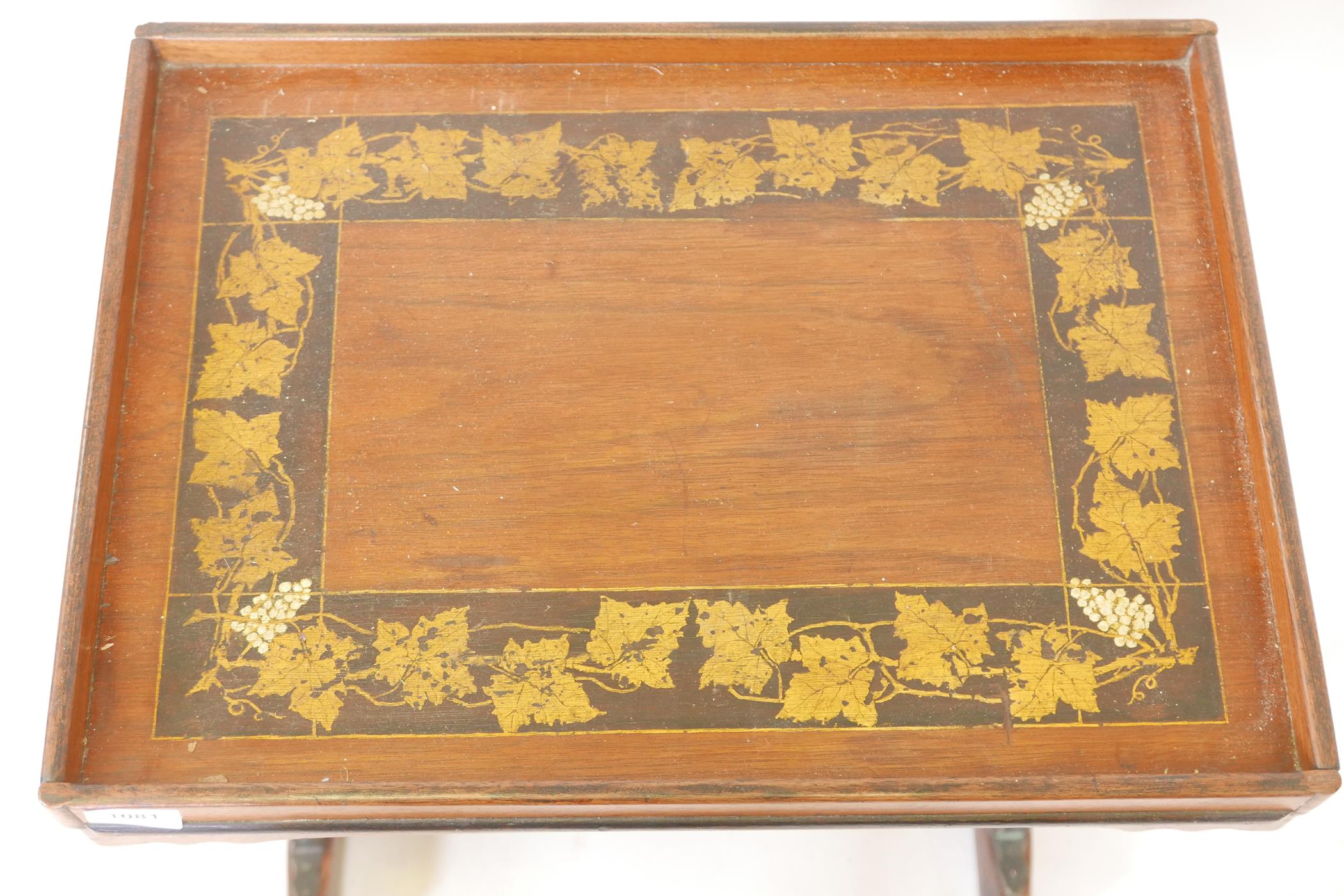 A C19th mahogany side table, with painted and parcel gilt top and shaped frieze, raised on end - Image 3 of 4