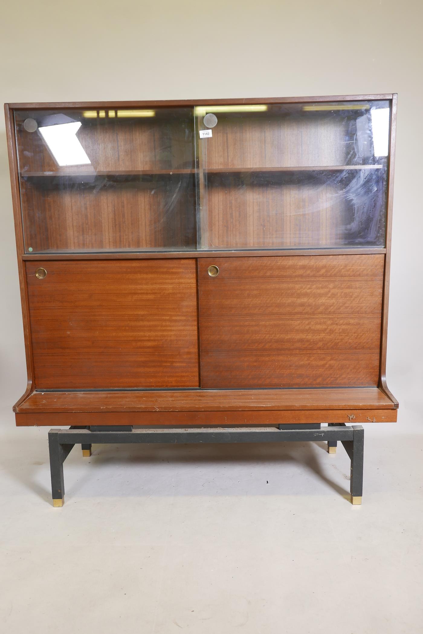 E. Gomme, G Plan mid century mahogany side cabinet with sliding doors and ebonised base, 48" x 18" x - Image 2 of 3