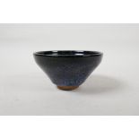 A Jian kiln pottery rice bowl with a black and blue glaze, Chinese, 5" diameter
