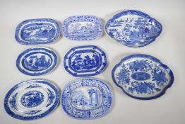 Eight C19th blue and white pottery dishes, various patterns to include the Long Bridge, Boy on a