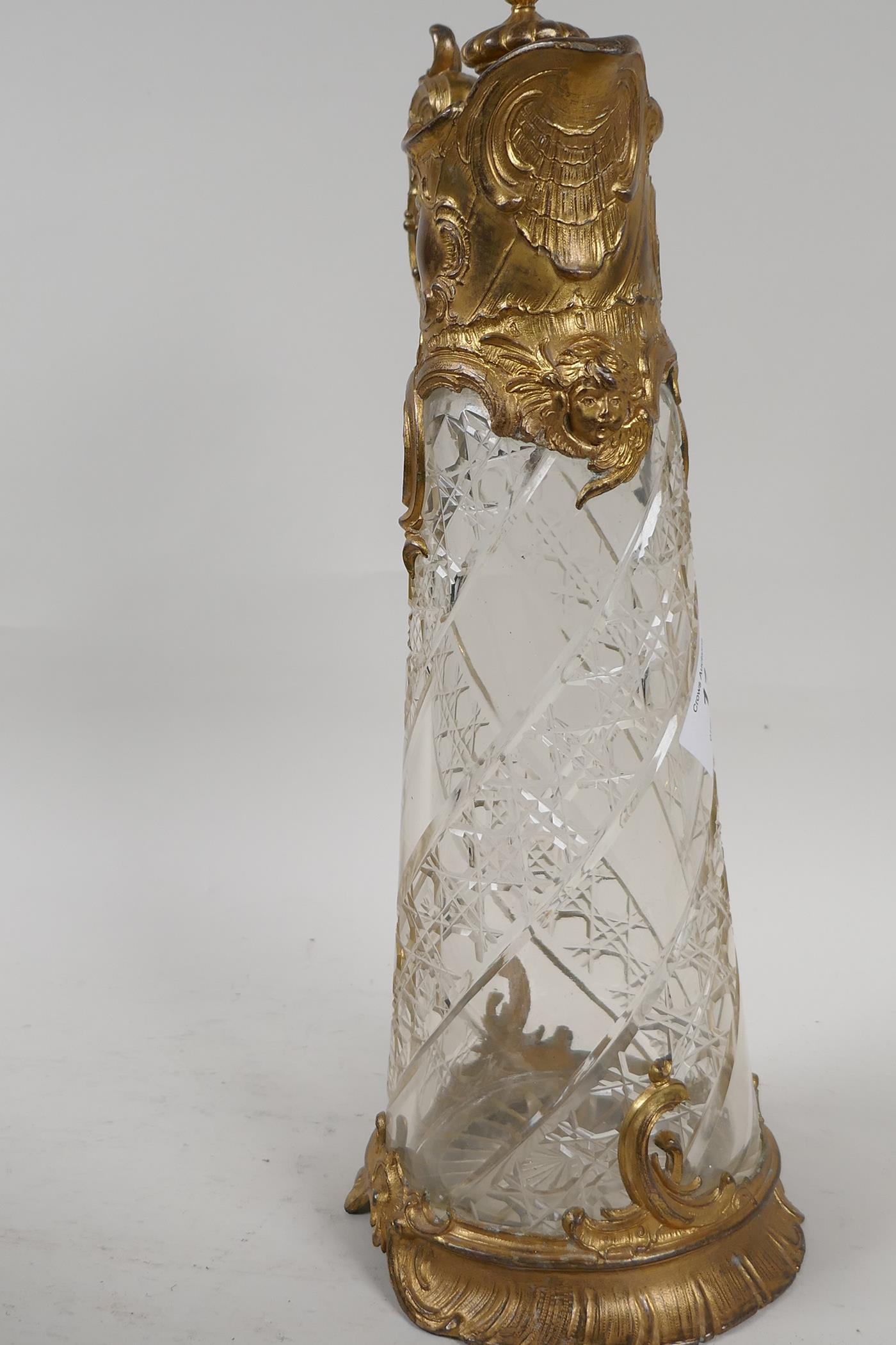 A C19th gilt metal and cut glass claret jug, 12" high - Image 3 of 3