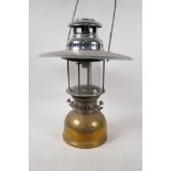 A German Petromex 826 brass and glass parafin lamp with chrome plated shade, 16½" high