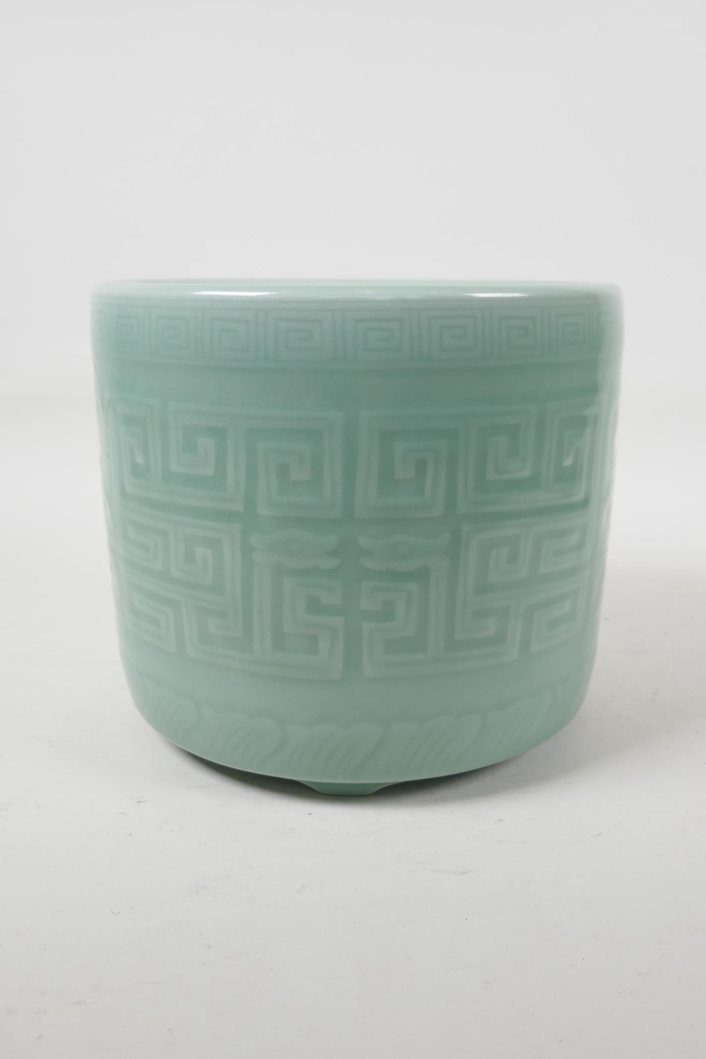 A celadon glazed porcelain brush pot with archaic style underglaze decoration, Chinese, 6½" high x - Image 3 of 4