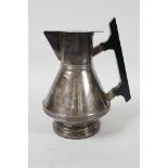 A late C19th Mappin & Webb Christopher Dresser design silver plated hot water jug with hardwood