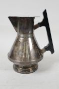 A late C19th Mappin & Webb Christopher Dresser design silver plated hot water jug with hardwood