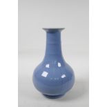 A Chinese blue crackleglaze vase with ribbed neck, 9" high